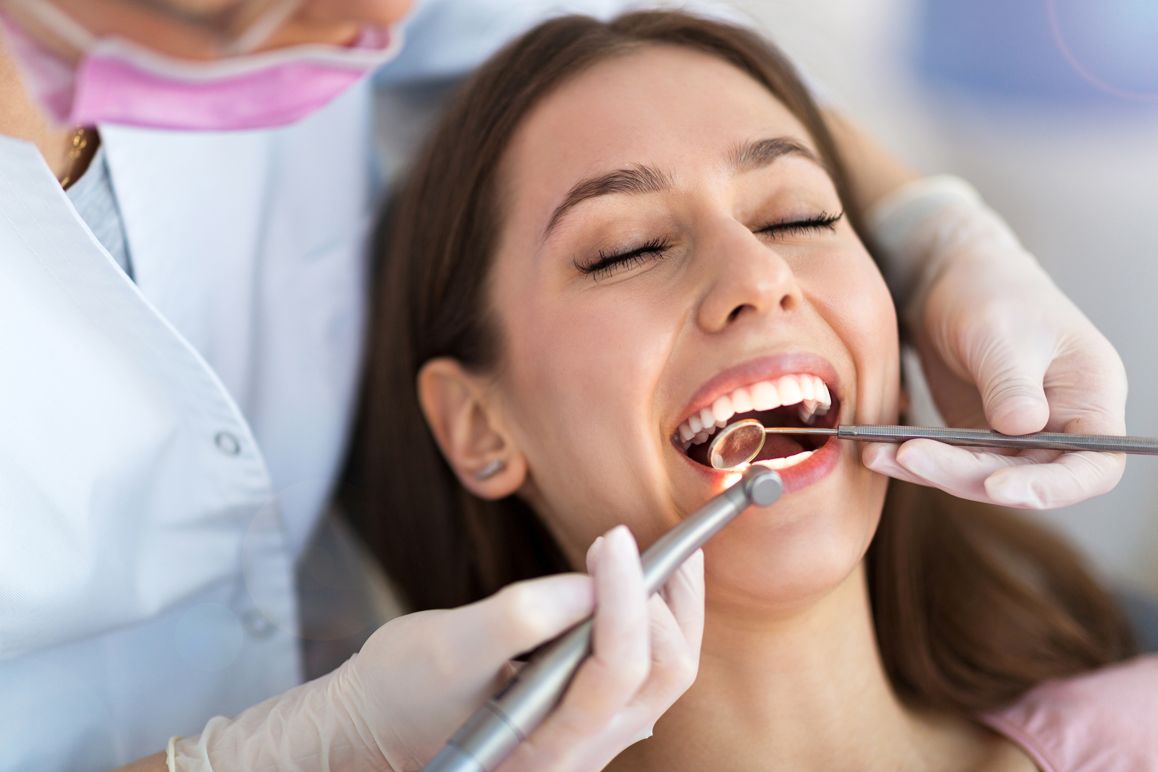 Dentist and patient in dentist office