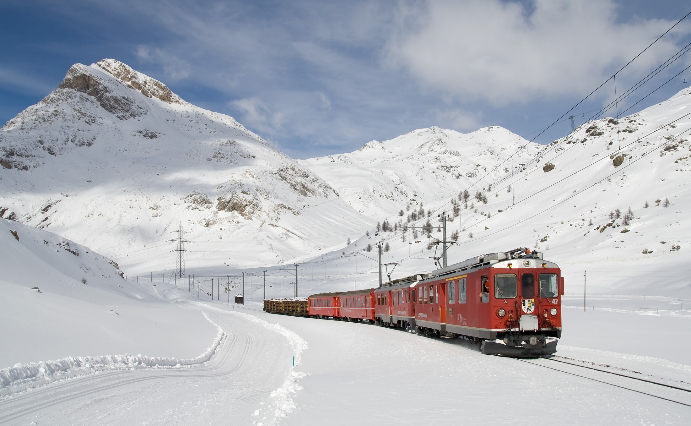 Train Passing through a Snowy Mountain